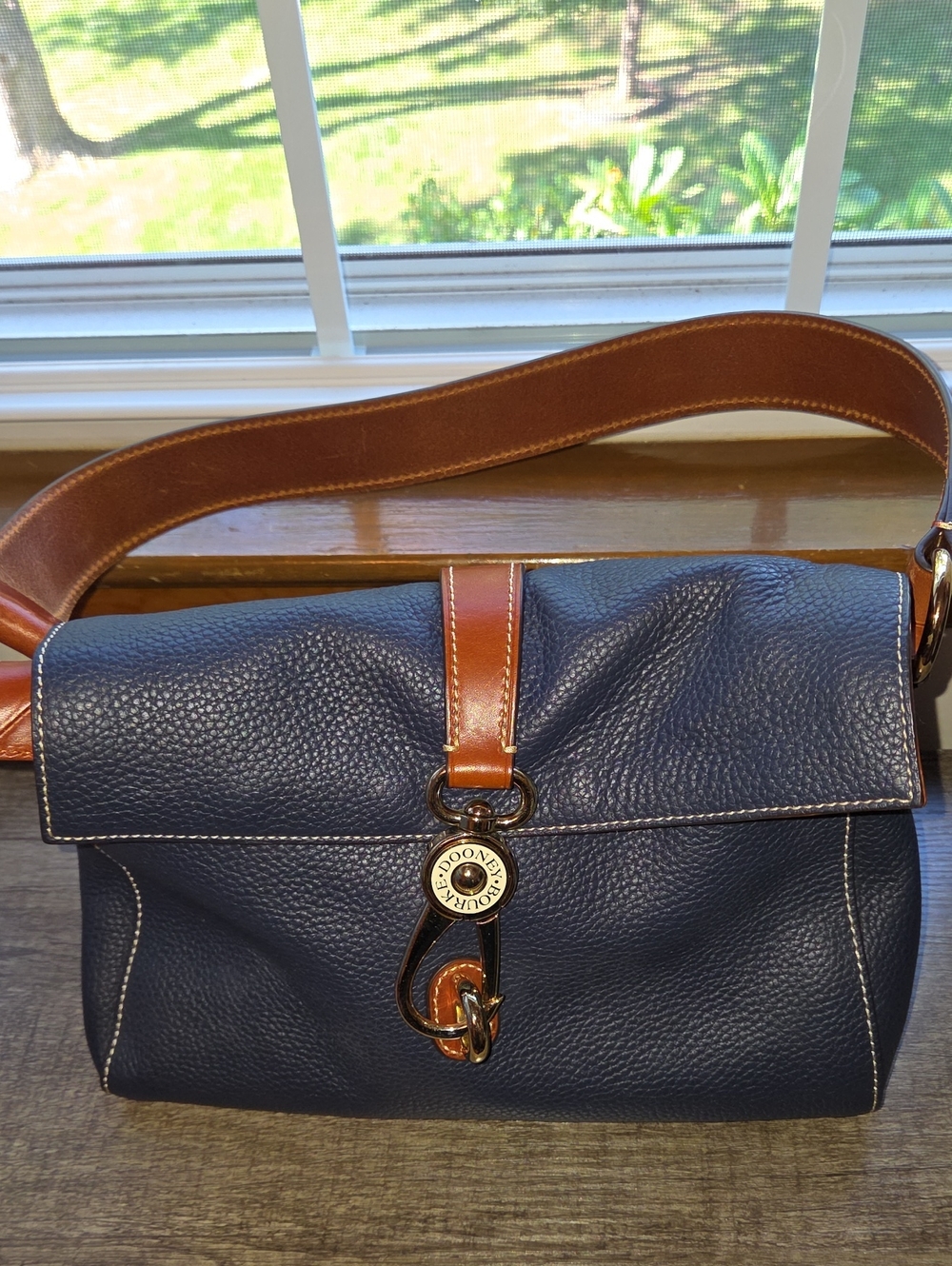 Dooney & Bourke Navy Pebbled Leather Messenger with Brown Trim